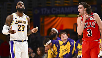 Mar 22, 2025; Los Angeles, California, USA; Los Angeles Lakers forward LeBron James (23) reacts to a foul call against Chicago Bulls guard Josh Giddey (3) during the first half at Crypto.com Arena. Mandatory Credit: Jonathan Hui-Imagn Images
