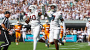 Sep 27, 2025; Starkville, Mississippi, USA; Mississippi State Bulldogs linebacker Nic Mitchell (40) and linebacker Zakari Tillman (7) react after a fumble recovery against the Tennessee Volunteers during the first half at Davis Wade Stadium at Scott Field. Mandatory Credit: Wesley Hale-Imagn Images