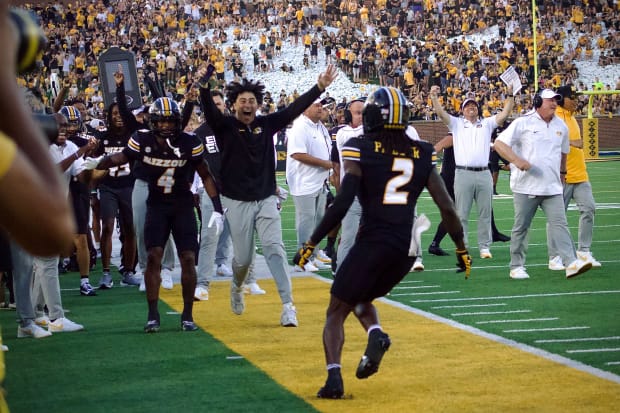 Missouri Tigers cornerback Toriano Pride Jr. (2) celebrates on the sideline after scoring a pick-six against Murray State.