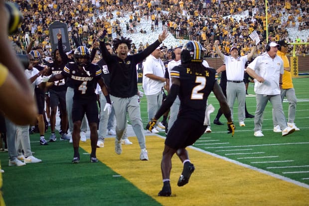 Missouri Tigers cornerback Toriano Pride Jr. (2) celebrates on the sideline after scoring a pick-six against Murray State.