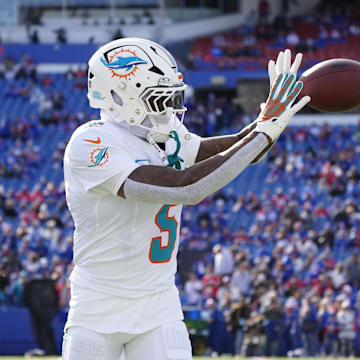 Nov 3, 2024; Orchard Park, New York, USA; Miami Dolphins cornerback Jalen Ramsey (5) warms up prior to the game against the Buffalo Bills at Highmark Stadium. Mandatory Credit: Gregory Fisher-Imagn Images
