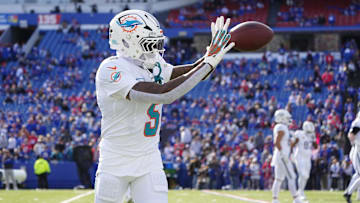 Nov 3, 2024; Orchard Park, New York, USA; Miami Dolphins cornerback Jalen Ramsey (5) warms up prior to the game against the Buffalo Bills at Highmark Stadium. Mandatory Credit: Gregory Fisher-Imagn Images