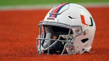 Sep 30, 2021; Miami Gardens, Florida, USA; A general view of a Miami Hurricanes helmet in the end zone prior to the game between the Miami Hurricanes and the Virginia Cavaliers at Hard Rock Stadium. Mandatory Credit: Jasen Vinlove-Imagn Images