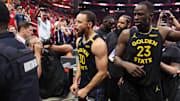 Golden State Warriors guard Stephen Curry (30) and forward Draymond Green walk off the court after Game 7 of their first-round playoff series against the Houston Rockets at Toyota Center in Houston on May 4, 2025.