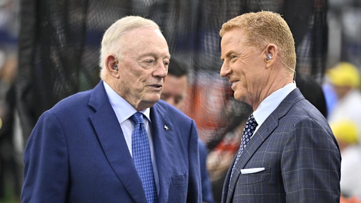 Dallas Cowboys owner Jerry Jones and NBC commentator Jason Garrett speak before a 2025 game against the Green Bay Packers