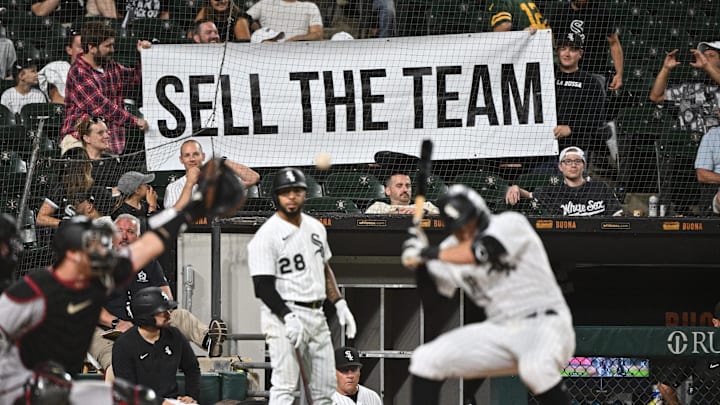 Frustrated Chicago White Sox fans hold up a sign urging to sell the team as outfielder AJ Pollock (18) bats in the ninth inning against the Arizona Diamondbacks at Guaranteed Rate Field. Arizona defeated Chicago 10-5. Mandatory Credit: Jamie Sabau-Imagn Images