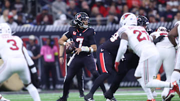 Dec 14, 2025; Houston, Texas, USA; Houston Texans quarterback C.J. Stroud (7) throws downfield during the second quarter against the Arizona Cardinals at NRG Stadium. Mandatory Credit: Troy Taormina-Imagn Images