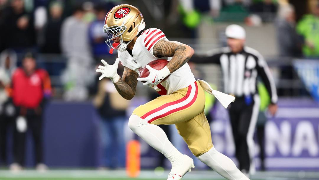 Jan 17, 2026; Seattle, WA, USA; San Francisco 49ers wide receiver Skyy Moore (9) returns a kickoff against the Seattle Seahawks during the second half in an NFC Divisional Round game at Lumen Field. Mandatory Credit: Kevin Ng-Imagn Images