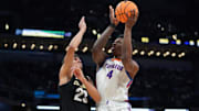 Mar 22, 2024; Indianapolis, IN, USA; Florida Gators forward Tyrese Samuel (4) shoots against Colorado Buffaloes forward Tristan da Silva (23) in the second half in the first round of the 2024 NCAA Tournament at Gainbridge FieldHouse. Mandatory Credit: Robert Goddin-Imagn Images