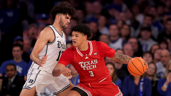 Texas Tech forward LeJuan Watts controls the ball against Duke forward Cameron Boozer.