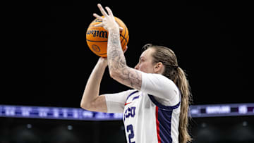 Mar 9, 2025; Kansas City, MO, USA; TCU Horned Frogs guard Madison Conner (2) shoots the ball against the Baylor Lady Bears during the first half at T-Mobile Center. Mandatory Credit: Amy Kontras-Imagn Images