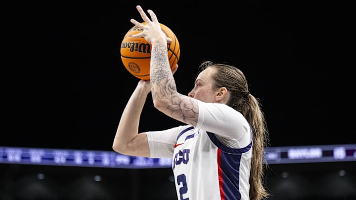 Mar 9, 2025; Kansas City, MO, USA; TCU Horned Frogs guard Madison Conner (2) shoots the ball against the Baylor Lady Bears during the first half at T-Mobile Center. Mandatory Credit: Amy Kontras-Imagn Images Mar 9, 2025; Kansas City, MO, USA; TCU Horned Frogs guard Madison Conner (2) shoots the ball against the Baylor Lady Bears during the first half at T-Mobile Center. Mandatory Credit: Amy Kontras-Imagn Images