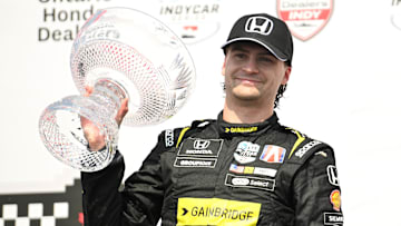 Jul 21, 2024; Toronto, Ontario, CAN;  Andretti Global driver Colton Herta (26) holds the crystal trophy after winning the Honda Dealers Indy at Streets of Toronto. Mandatory Credit: Dan Hamilton-Imagn Images