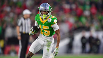 Jan 1, 2025; Pasadena, CA, USA; Oregon Ducks wide receiver Tez Johnson (15) runs against the Ohio State Buckeyes in the second half in the 2025 Rose Bowl college football quarterfinal game at Rose Bowl Stadium.