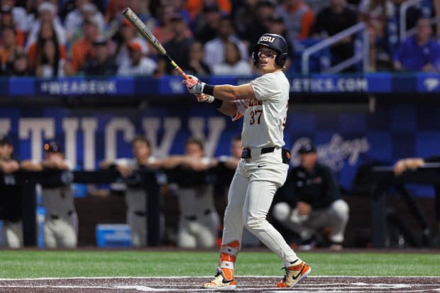 Travis Bazzana watches a foul ball he hit 