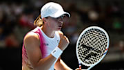 Iga Swiatek reacts to a point at the Australian Open.