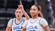UCLA Bruins center Lauren Betts (51) points up after scoring Saturday, March 8, 2025, in a semifinals game at the 2025 TIAA Big Ten Women's Basketball Tournament between the UCLA Bruins and the Ohio State Buckeyes at Gainbridge Fieldhouse in Indianapolis.