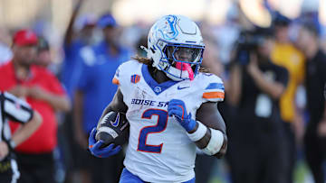 Oct 12, 2024; Honolulu, Hawaii, USA;  Boise State Broncos running back Ashton Jeanty (2) cuts through the Hawaii Rainbow Warriors defense for a touchdown during the first quarter at Clarence T.C. Ching Athletics Complex. Mandatory Credit: Marco Garcia-Imagn Images