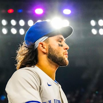 Toronto Blue Jays shortstop Bo Bichette (11) returns to the dugout before playing the New York Yankees at Rogers Centre on June 29.