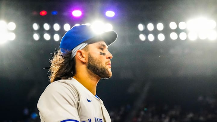 Toronto Blue Jays shortstop Bo Bichette (11) returns to the dugout before playing the New York Yankees at Rogers Centre on June 29.