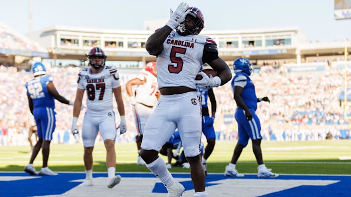 Sep 7, 2024; Lexington, Kentucky, USA; South Carolina Gamecocks running back Raheim Sanders (5) celebrates after scoring a touchdown during the third quarter against the Kentucky Wildcats at Kroger Field. Mandatory Credit: Jordan Prather-Imagn Images