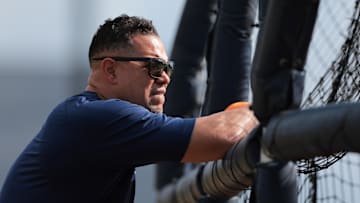 Feb 14, 2025; West Palm Beach, FL, USA; Houston Astros hitting coach Alex Cintron (37) watches batting practice during spring training at CACTI Park of the Palm Beaches. 