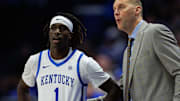 Nov 26, 2025; Lexington, Kentucky, USA; Kentucky Wildcats head coach Mark Pope talks with guard Denzel Aberdeen (1) during the first half against the Tennessee Tech Golden Eagles at Rupp Arena at Central Bank Center. Mandatory Credit: Jordan Prather-Imagn Images