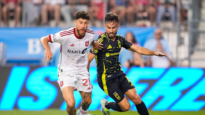 TFC Captain Jonathan Osorio battles with the Crew's Diego Rossi during their match last season in August of last year.