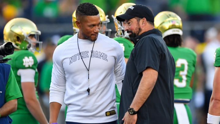 Sep 23, 2023; South Bend, Indiana, USA; Notre Dame Fighting Irish head coach Marcus Freeman and Ohio State Buckeyes head coach Ryan Day chat before the game at Notre Dame Stadium. Mandatory Credit: Matt Cashore-USA TODAY Sports