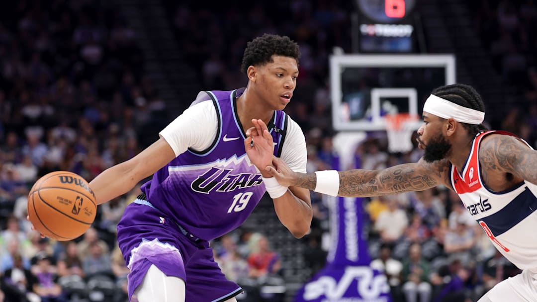 Mar 25, 2026; Salt Lake City, Utah, USA;  Utah Jazz forward Ace Bailey (19) controls the ball as Washington Wizards guard Jaden Hardy (8) defends during the second half at Delta Center. Mandatory Credit: Chris Nicoll-Imagn Images