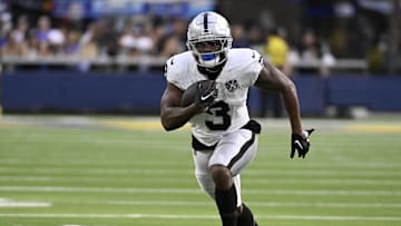 Oct 20, 2024; Inglewood, California, USA; Las Vegas Raiders running back Zamir White (3) runs after a catch against the Los Angeles Rams during the second half at SoFi Stadium. Mandatory Credit: Alex Gallardo-Imagn Images