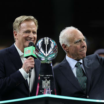  NFL commissioner Roger Goodell (L) stands with Philadelphia Eagles owner Jeffrey Lurie (R) during the championship trophy presentation after the Eagles' game against the Kansas City Chiefs in Super Bowl LIX at Caesars Superdome. 