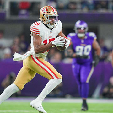 Oct 23, 2023; Minneapolis, Minnesota, USA; San Francisco 49ers wide receiver Jauan Jennings (15) runs after the catch against the Minnesota Vikings in the first quarter at U.S. Bank Stadium.