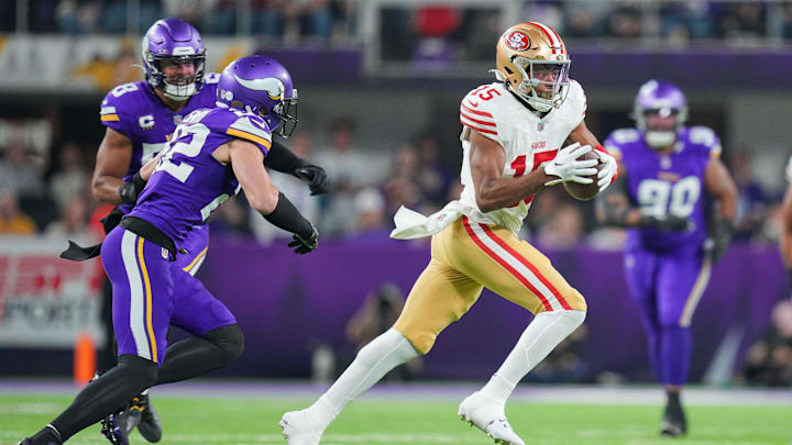 Oct 23, 2023; Minneapolis, Minnesota, USA; San Francisco 49ers wide receiver Jauan Jennings (15) runs after the catch against the Minnesota Vikings in the first quarter at U.S. Bank Stadium.