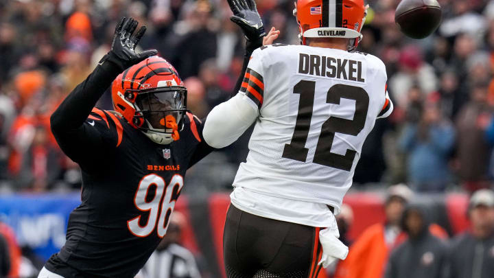 Cincinnati Bengals defensive end Cam Sample (96) rushes Cleveland Browns quarterback Jeff Driskel (12) in the first quarter of the NFL Week 18 game between the Cincinnati Bengals and the Cleveland Browns at Paycor Stadium in downtown Cincinnati on Sunday, Jan. 7, 2024.