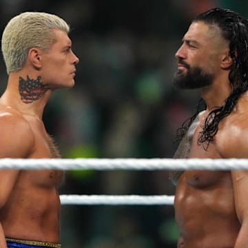 Apr 7, 2024; Philadelphia, PA, USA; 	WWE Universal Championship match between Roman Reigns and Cody Rhodes during Wrestlemania XL Sunday at Lincoln Financial Field. Mandatory Credit: Joe Camporeale-Imagn Images