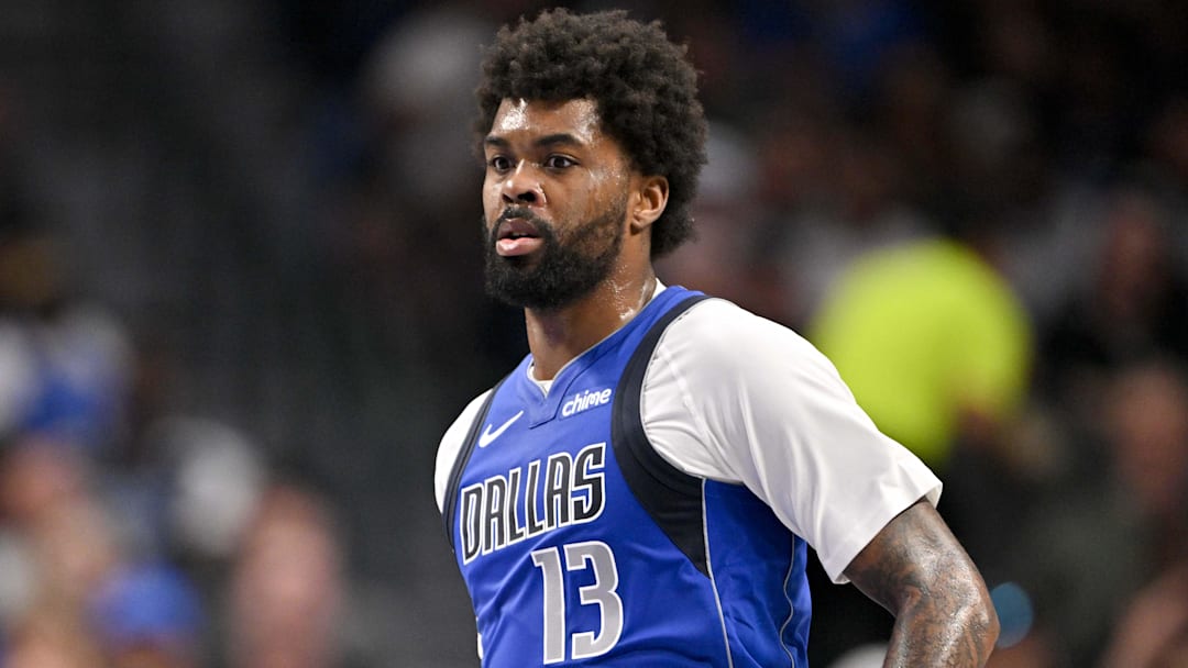 Feb 26, 2026; Dallas, Texas, USA; Dallas Mavericks forward Naji Marshall (13) brings the ball up court against the Sacramento Kings during the second quarter at the American Airlines Center. Mandatory Credit: Jerome Miron-Imagn Images