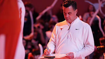 Texas Longhorns head coach Sean Miller reviews a play before the start of the game against the Southern University Jaguars at Moody Center.