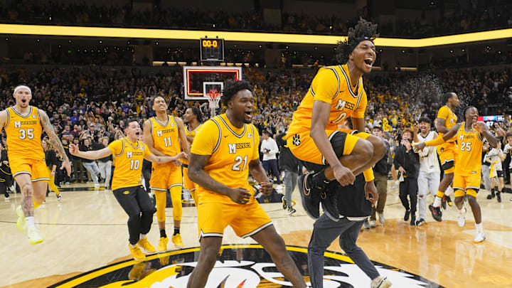 Dec 8, 2024; Columbia, Missouri, USA; The Missouri Tigers celebrate after defeating the Kansas Jayhawks at Mizzou Arena. Mandatory Credit: Jay Biggerstaff-Imagn Images