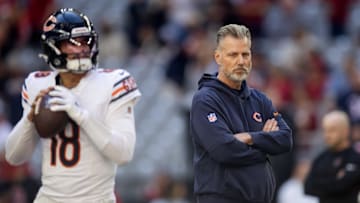 Nov 3, 2024; Glendale, Arizona, USA; Chicago Bears head coach Matt Eberflus watches quarterback Caleb Williams (18) prior to the game against the Arizona Cardinals at State Farm Stadium. Mandatory Credit: Mark J. Rebilas-Imagn Images