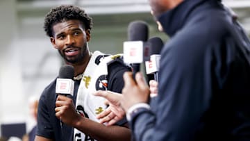 Apr 4, 2025; Boulder, CO, USA; Colorado Buffaloes quarterback Shedeur Sanders (2) talks to ESPN after the University of Colorado NFL Showcase at the CU Indoor Practice Facility. Mandatory Credit: Michael Ciaglo-Imagn Images