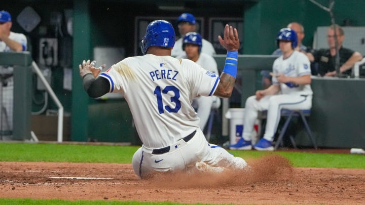 Jun 10, 2024; Kansas City, Missouri, USA; Kansas City Royals first baseman Salvador Perez (13) scores against the New York Yankees in the eighth inning at Kauffman Stadium. Mandatory Credit: Denny Medley-USA TODAY Sports