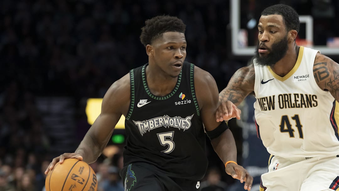 Feb 6, 2026; Minneapolis, Minnesota, USA; Minnesota Timberwolves guard Anthony Edwards (5) dribbles the ball past New Orleans Pelicans guard Saddiq Bey (41) in the second half at Target Center. Mandatory Credit: Jesse Johnson-Imagn Images