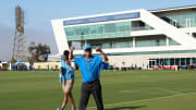 Jul 24, 2024; El Segundo, CA, USA;  Los Angeles Chargers head coach Jim Harbaugh reacts with fans prior to the first day of training camp at The Bolt. Mandatory Credit: Kiyoshi Mio-USA TODAY Sports