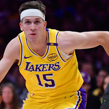 Apr 30, 2025; Los Angeles, California, USA; Los Angeles Lakers guard Austin Reaves (15) moves to the basket against the Minnesota Timberwolves during the first half in game five of first round for the 2025 NBA Playoffs at Crypto.com Arena. Mandatory Credit: Gary A. Vasquez-Imagn Images