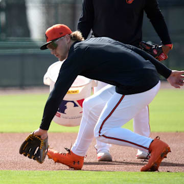 Orioles infielder Gunnar Henderson fields a ground ball during drills on Tuesday. The Baltimore Orioles held their first full-squad workout of the 2025 spring training season on Tuesday, Feb. 18th in Sarasota, Florida.