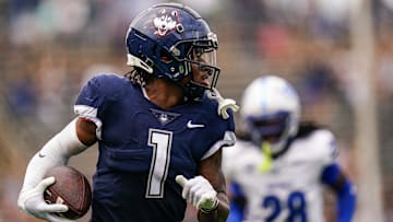 Sep 28, 2024; East Hartford, Connecticut, USA; Connecticut Huskies wide receiver Skyler Bell (1) makes the touchdown catch against the Buffalo Bulls in the second quarter at Rentschler Field at Pratt & Whitney Stadium. Mandatory Credit: David Butler II-Imagn Images