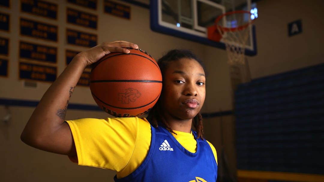 Divine Bourrage, a guard for Davenport North's girl's basketball team, poses for a portrait Wednesday, Nov. 29, 2023 at Davenport North High School.