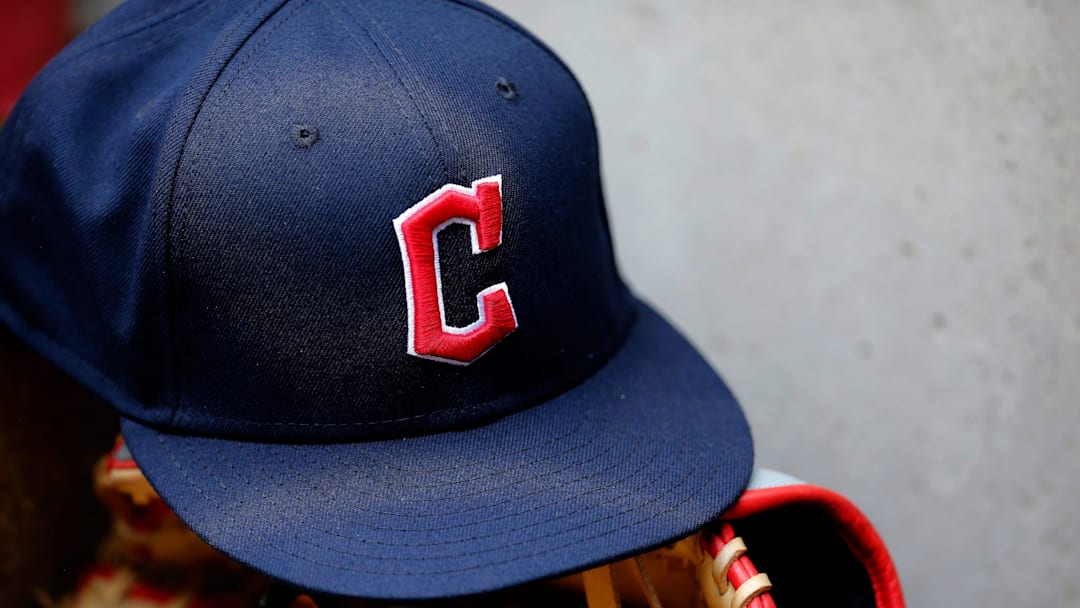 A ball cap sports the Cleveland Guardians logo in the third inning of the MLB Inter-league game between the Cincinnati Reds and the Cleveland Guardians at Great American Ball Park in downtown Cincinnati.