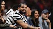 Jan 14, 2022; Miami, Florida, USA; Canadian rapper Drake attends the game between the Miami Heat and the Atlanta Hawks at FTX Arena. Mandatory Credit: Sam Navarro-Imagn Images
